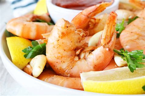 A Cook Steams Shrimp For A Seafood Salad