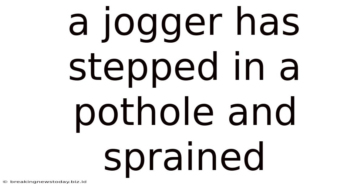 A Jogger Has Stepped In A Pothole And Sprained