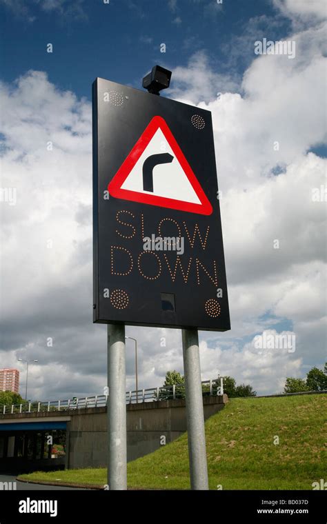 Slow Down For A Right Turn Sign